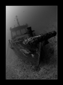 Small fishing boat wreck by Charles Wright 